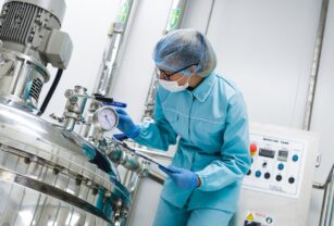plant picture, scientist standing with tablet, bend on tank